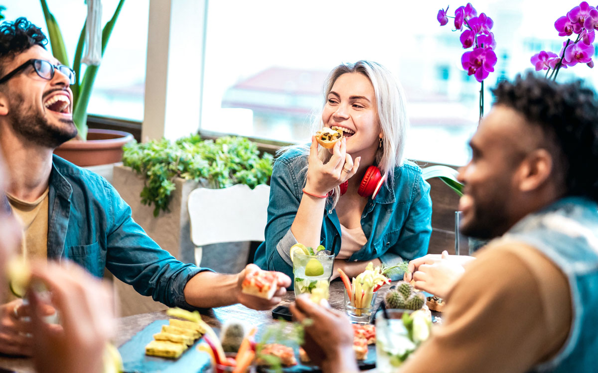 Friends Enjoying A Meal Together